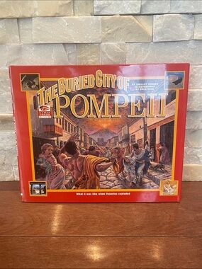 Scholastic The Buried City of Pompeii Hardcover Book